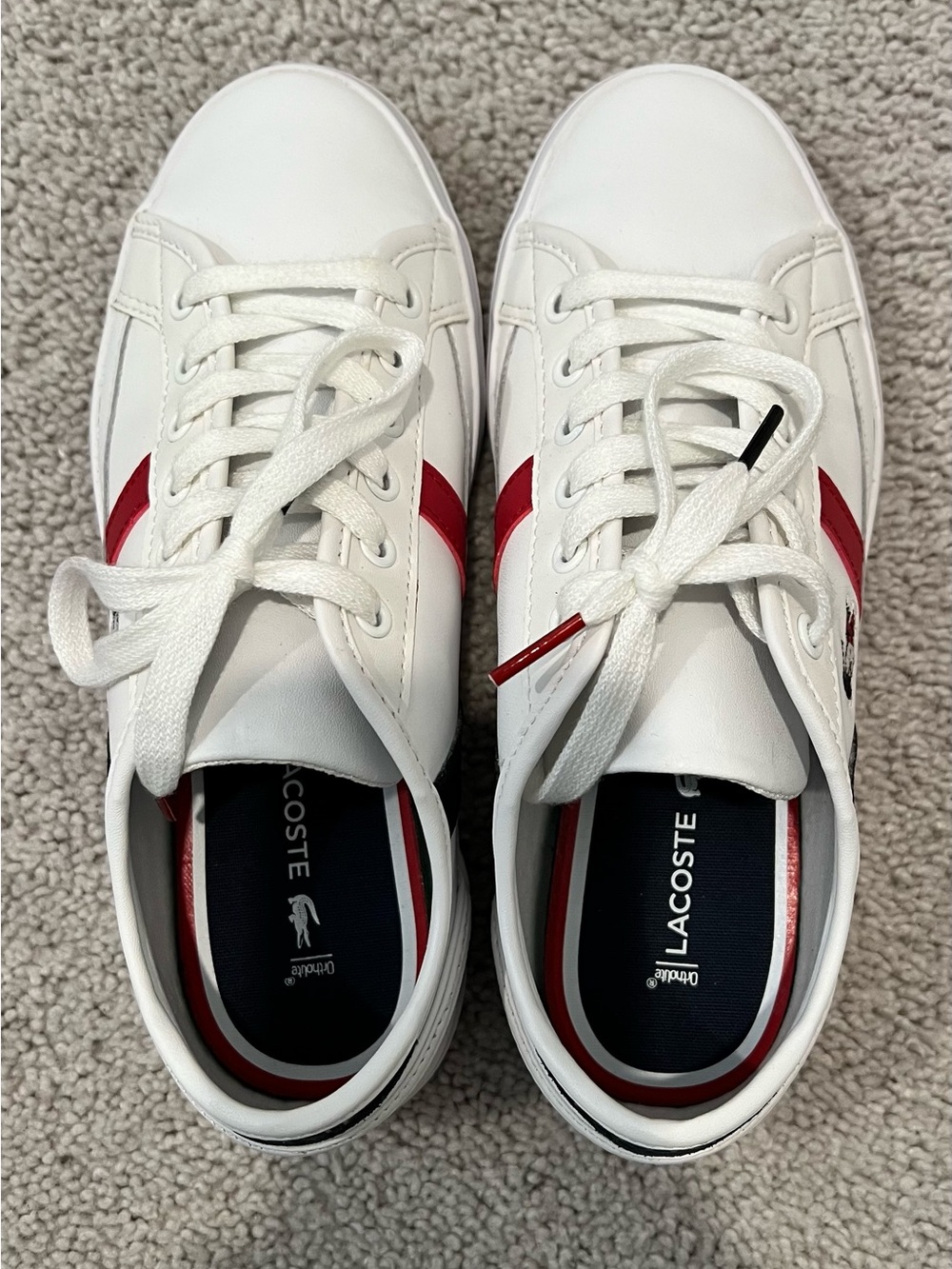Lacoste White Sneakers with Red Stripe Accents